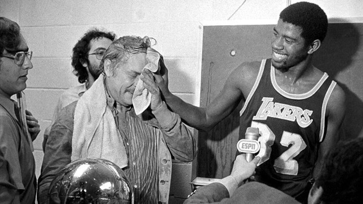 Magic Johnson and Jerry Buss: A legendary duo? Learn about their unique owner-player bond.